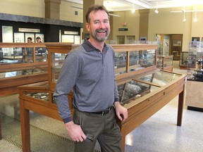 Mark Badham, in the Miller Museum of Geology in Kingston on Tuesday, has been recognized by the Ontario Museum Association for his career as the museum's curator, a position he has held for the past 30 years. (Michael Lea/The Whig-Standard)