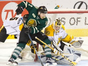 Sarnia Sting goalie Justin Fazio stops London Knights forward Matthew Tkachuk in this Postmedia file photo from last season. As the Sting try to snap a four-game losing skid when the Kitchener Rangers arrive in Sarnia Wednesday night, the coaching staff is preaching a simple game to its players, citing the London Knights as an example. (DEREK RUTTAN, Postmedia Network)