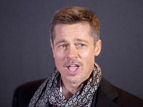 Brad Pitt poses during a photocall for the premiere of the new film ‘Allied’ in Madrid, Spain Tuesday Nov. 22, 2016. (AP Photo/Abraham Caro Marin)