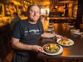 Whalesbone chef Michael Radford with two of his dishes, Ling Cod and Cornish Hen. WAYNE CUDDINGTON / POSTMEDIA