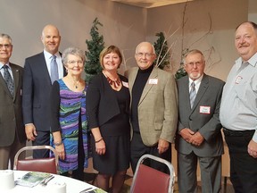 From left, Kent Agriculture Hall of Fame Association president Ken Stevenson was on hand to greet Jon Neutens, Peggy Neutens, Alice Uher, William Buchanan, Doug Buchanan, and Karl Leeson at the KAHFA annual induction ceremony Nov. 15. Uher and the Buchanan brothers were all inducted along with Henry Neutens and William Leeson, both posthumously.