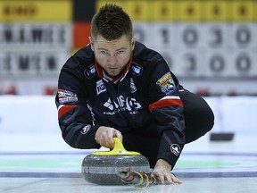 Mike McEwen delivers a rock during the Manitoba men's curling championship earlier this year. McEwen is hoping to earn a spot in the Canadian Curling Trials at next week's Canada Cup in Brandon. (Kevin King/Winnipeg Sun file photo)