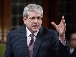 NDP MP Charlie Angus takes part in an emergency debate on the suicide crisis on Aboriginal reserves, particularly in Attawapiskat in Ontario, in the House of Commons in Ottawa, Tuesday, April 12, 2016. THE CANADIAN PRESS/Adrian Wyld