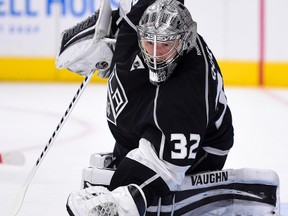 In this April 22, 2016 file photo, Los Angeles Kings goalie Jonathan Quick stops a shot during the first period of Game 5 in an NHL hockey Stanley Cup playoffs first-round series against the San Jose Sharks in Los Angeles. (AP Photo/Mark J. Terrill, File)