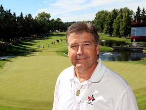 Golf Canada CEO Scott Simmons poses for a photo at the 18th hole during the opening round at the 2013 CN Canadian Women's Open at the Royal Mayfair Golf Club in Edmonton on Aug. 22, 2013. (David Bloom/Edmonton Sun)