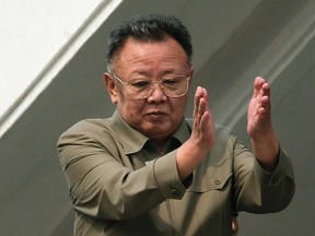 In this Oct. 10, 2010 photo, North Korean leader Kim Jong Il applauds following a massive military parade marking the 65th anniversary of the communist nation's ruling Workers' Party in Pyongyang, North Korea.  (AP Photo/Vincent Yu, File)