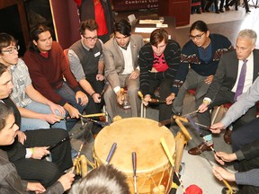 The Wabnode men's drum group perform at a ceremony marking a partnership between Cambrian College and the National Centre for Truth and Reconciliation at Cambrian College in Sudbury, Ont. on Wednesday November 23, 2016. John Lappa/Sudbury Star/Postmedia Network