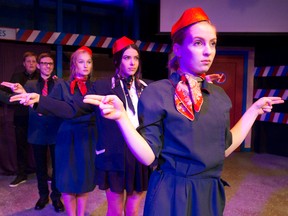 Flight attendants, from left, Jackson Gilson, Josh Larizza, Ava Wombwell, Jemma McKee and Sophie Moodie perform in the Original Kids Theatre Comany?s production of Secrets Every Smart Traveler Should Know at the Spriet Family Theatre at the Covent Garden Market. (CRAIG GLOVER, The London Free Press)