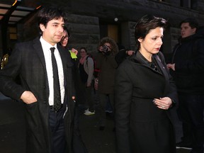 Jian Ghomeshi and lawyer Marie Henein leave Old City Hall during his trial February 8, 2016. (Craig Robertson/Toronto Sun)