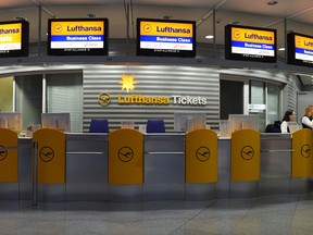 A flight passenger stands at a counter of German airline Lufthansa at the Franz-Josef-Strauss airport in Munich, southern Germany, on November 24, 2016.
Pilots at German flagship carrier Lufthansa stayed away from work for a second straight day, forcing the airline to scrap 912 flights and grounding 115,000 more passengers. (HRISTOF STACHECHRISTOF STACHE/AFP/Getty Images)