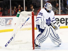 Toronto Maple Leafs goalie Jhonas Enroth's stick is stuck on his net during the second period of an NHL hockey game against the New Jersey Devils, Wednesday, Nov. 23, 2016, in Newark, N.J. (AP Photo/Julio Cortez)