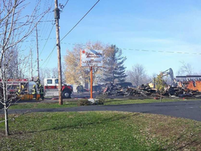 First responders clean up after fire destroyed a flea market near Smiths Falls Nov. 6.