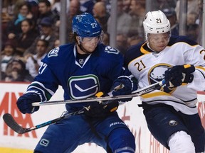 The Canucks signed defenceman Ben Hutton (27) to a two-year contract extension on Thursday, Nov. 24, 2016. (Jonathan Hayward/The Canadian Press)