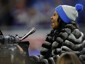 Detroit native Aretha Franklin sings the National Anthem prior to the start of the Detroit Lions and the Minnesota Vikings game at Ford Field on November 24, 2016 in Detroit, Michigan. (Gregory Shamus/Getty Images)