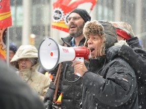 Larry Rousseau, a regional executive vice-president with the Public Service Alliance of Canada in Ottawa, speaks to a noon hour rally Thursday held outside the Ottawa headquarters of the Federal Bridge Corporation. The rally was held to support unionize workers on strike at the Blue Water Bridge in Point Edward. (Handout)