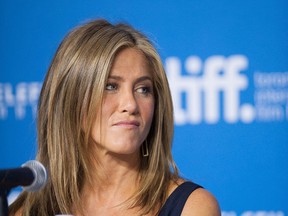 Actor Jennifer Aniston listens during a press conference for ‘Cake’ at the 2014 Toronto International Film Festival in Toronto on Tuesday, Sept. 9, 2014. (THE CANADIAN PRESS/Hannah Yoon)
