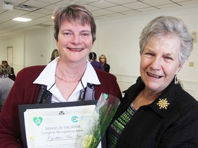 Cynthia MacNeil, left, was recently honoured at a Erie St. Clair CCAC Heroes in the Home recognition event. She's pictured with Pat Dawson, who nominated her. (Tyler Kula/Sarnia Observer)