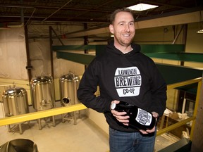David Thuss, worker-co-owner of London Brewing Co-op is pleased that the brewery is expanding in London, Ont. on Thursday November 24, 2016. (DEREK RUTTAN, The London Free Press)