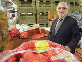 University of Manitoba Social Work professor Sid Frankel stands with food at Winnipeg Harvest in Winnipeg, Man. Thursday November 24, 2016. Frankel is the author of the Manitoba Child and Family Poverty Report Card 2016. (Brian Donogh/Winnipeg Sun/Postmedia Network)