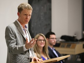 Sun columnist Anthony Furey, the Canadian Taxpayers Federation Christine Van Geyn and Chad Hallman from Students in Support of Free Speech talk about political correctness at the University of Toronto, on Nov. 24, 2016. (Stan Behal/Toronto Sun)