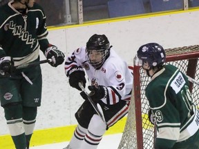 Sarnia Legionnaires forward Nolan DeGurse slips between St. Marys Lincolns Andrew Bogdon, left, and Brandon Glover during the Greater Ontario Junior Hockey League game at Sarnia Arena on Thursday, Nov. 24, 2016 in Sarnia, Ont. DeGurse, a 15-year-old Bright's Grove resident from the Lambton Jr. Sting minor midgets, made his GOJHL debut. (Terry Bridge/Sarnia Observer)