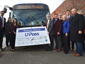 Elected officials pose in front of an ETS bus as they celebrate welcoming the cities of Fort Saskatchewan, Leduc and Spruce Grove to the U-Pass program, in Edmonton on Thursday, November 24, 2016. Ed Kaiser/Postmedia