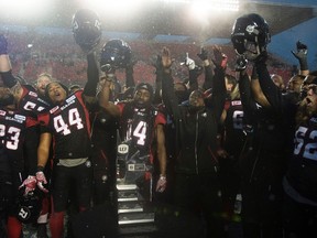 Ottawa RedBacks players Domaso Munoz, Tristan Jackson and Jon Gott all have memories of this city - and maybe something to prove in eliminating the Eskimos. (The Canadian Press)