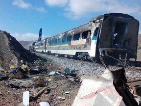 This picture released by Iranian Fars News Agency shows the scene of two trains collision about 150 miles (250 kilometers) east of the capital Tehran, Iran, Friday, Nov. 25, 2016. An Iranian official has told state TV that the death toll from a train collision in the country's north has increased to 31. The provincial governor, Mohammad Reza Khabbaz, says that so far 31 bodies have been found at the site of the crash on Friday morning. (Saeed Esmaeilpour, Fars News Agency via AP)