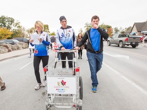 Joe Roberts is show in this file photo in St. Catharines Nov. 1, during his walk across Canada to raise funds and awareness of youth homelessness. Students and faculty at Lambton College were taking part in a Sleep Out Challenge Friday, a program of Roberts' Push for Change initiative. (File photo/St. Catharines Standard/Postmedia Network)