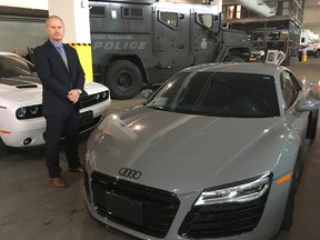 A York Regional Police investigation, dubbed Project Cyclone, has dismantled an alleged criminal organization suspected of running a huge auto theft ring and committing an assortment of other crimes. Det.-Sgt. Paul LaSalle said a total 60 stolen vehicles worth $3.4 million, including these two luxury cars, were seized. (Chris Doucette/Toronto Sun)