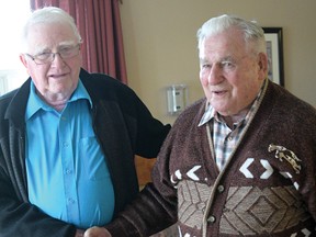 Les Shackelton and Sandy Shantz, 91-year-old retired auctioneers, recently met for the first time to swap stories. (CHRIS ABBOTT/TILLSONBURG NEWS)