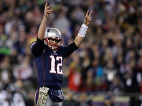 Patriots quarterback Tom Brady was a limited participant in Friday's practice ahead of Sunday's game against the Jets. (Charles Krupa/AP Photo/Files)