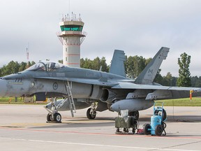 Canadian CF-18 fighter jet is seen on the tarmac in this Sept. 1, 2014, file photo. (Ernest Doroszuk/Postmedia Network File Photo)