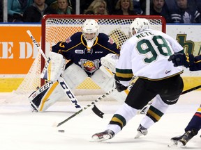 London Knights defenceman Victor Mete races in on Barrie Colts goalie Christian Propp on his way to scoring the opening goal in the first period of their OHL game at Budweiser Gardens on Friday. (CRAIG GLOVER, The London Free Press)