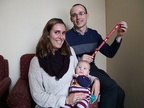 Jason Fogg, and his wife, Lindsay, and their son, Owen, 4 months, attended the launch of the annual Red Ribbon Campaign on Friday. Jason spoke at the event about the dangers of texting and driving. John Lappa/Sudbury Star