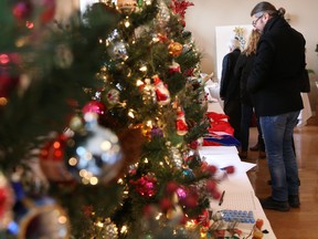 Visitors check out some decorated trees on display at the County Festival of Trees on Saturday November 26, 2016 in Prince Edward County, Ont. Tim Miller/Belleville Intelligencer/Postmedia Network