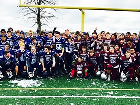 Members of the Quinte Saints and Kingston Frontenac Falcons junior football teams gather in the end zone after Saturday's 2016 National Capital Bowl AA final was called off due to unsafe playing conditions at Beckwith Fields near Calreton Place. (QSS Athletics photo)