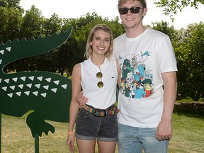 Emma Roberts and Evan Peters are seen in a 2014 file photo.  (Chris Weeks/Getty Images for LACOSTE)