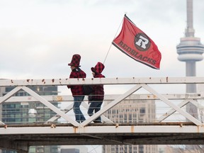Redblacks fans arrive for Sunday night's Grey Cup game in Toronto. The CFL championship will be held in Ottawa next November.  (THE CANADIAN PRESS/PHOTO)