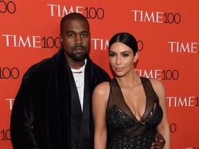 Honorees Kim Kardashian and Kanye West attend the Time 100 Gala celebrating the Time 100 issue of the Most Influential People at The World at Jazz at Lincoln Center on April 21, 2015 in New York. (TIMOTHY A. CLARY/AFP/Getty Images)