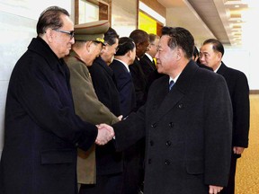 In this photo distributed by the North Korean government, Choe Ryong Hae, right, a vice chairman of North Korea's Workers' Party, is sent off before leaving Pyongyang, North Korea, for Cuba Monday, Nov. 28, 2016. Independent journalists were not given access to cover the event depicted in this image distributed by the Korean Central News Agency via Korea News Service. Reports from Pyongyang said North Korean leader Kim Jong Un sent a wreath to the Cuban Embassy and that a delegation of senior North Korean officials, led by Choe, left for Havana to attend the late Fidel Castro's memorial services. (Korean Central News Agency/Korea News Service via AP)