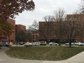 Police respond to reports of an active shooter on campus at Ohio State University on Monday, Nov. 28, 2016, in Columbus, Ohio. (AP Photo/Andrew Welsh-Huggins)