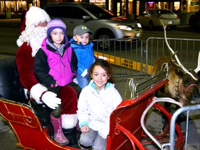 At the Mitchell BIA's Downtown Street Party last Friday, Nov. 25, Cambell, Peyton and Brooks Ward had the chance to spend some quality time with Santa and one of his reindeer before he decides whether they should go on the good list or the naughty list. It's always good to get some face time in with the guy who makes all of the important decisions. A good crowd attended the party held under cool but dry weather conditions, as the holiday shopping season intensifies. GALEN SIMMONS MITCHELL ADVOCATE