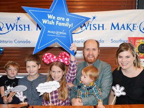 During a lunch at Pizza Hut in London Nov. 23, Asher Britton (left) wish came true as Make-a-Wish Southern Ontario surprised him with a trip for his whole family to Walt Disney World in Orlando, Fla. Also pictured are his siblings Joel, Calla, Mylo and parents Jesse and Lisa. SUBMITTED