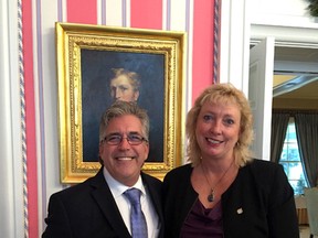 Sarnia's Rick LaBelle, shown standing with Sarnia-Lambton MP Marilyn Gladu at Rideau Hall Friday, holds a Meritorious Service Decoration presented posthumously Friday in honour of LaBelle's late wife, Joanne Klauke-LaBelle, during a ceremony at the residence of the Governor General. Klauke-LaBelle, founder of Harmoney for Youth, was one of 45 recipients to receive the honour Friday in Ottawa.
 Handout/Sarnia Observer/Postmedia Network