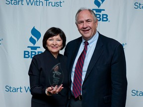 Jo-Ann Fisher of Hangar9 by Fisher & Company (pictured with John Leitch, Fanshawe College Board of Governors) was awarded the 2016 Better Business Bureau Business Integrity Award in the category of Businesses with Over 10 Employees. (Photo courtesy of Blue Iris Photography)