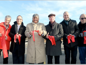 Old CFB Rockliffe was officially opened for new home sales Monday (Nov. 28, 2016) with a ribbon cutting that included (from left): Tartan Homes co-owner Ian Nicol, Jean Lachance, Sr., Dir. of Real Estate for Canada Lands Company, Claridge Homes founder Bill Maholtra, Uniform Developments co-founder John McDougall, city councillor Tobi Nussbaum and Jerry Lavalley from Algonquins of Ontario. (Julie Oliver, Postmedia)