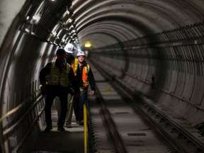Safety personnel walk along the tunnel at the TTC York University subway station (TYSSE) under construction in Toronto November 28, 2016. (Ernest Doroszuk/Toronto Sun)