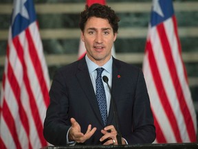 Canadian Prime Minister Justin Trudeau speaks during a joint news conference with Liberian President Ellen Johnson Sirleaf at the Ministry of Foreign Affairs in Monrovia on Thursday November 24, 2016. THE CANADIAN PRESS/Adrian Wyld