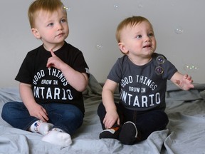 Barrett in a T-shirt and Jensen, 11 months, in a onesie (with jeans over top) created by the the Good Kid Clothing Co. founded by Barrett?s mom Tessa Coles and aunt Celia Coles. (MORRIS LAMONT, The London Free Press)